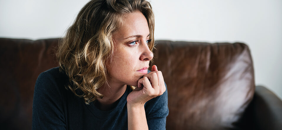woman looking worried