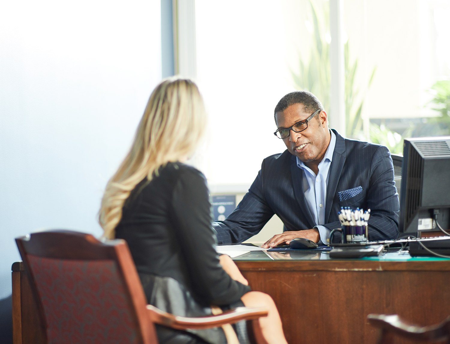 Community Association Banker helping a customer