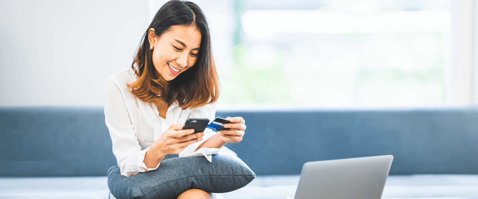 woman on sofa turning on Card Controls