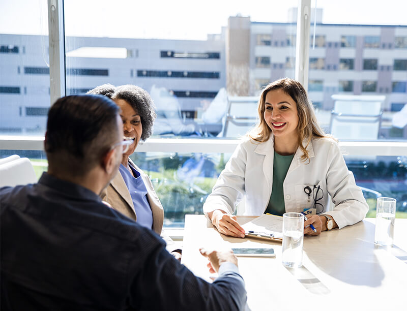 Doctor meeting with bankers