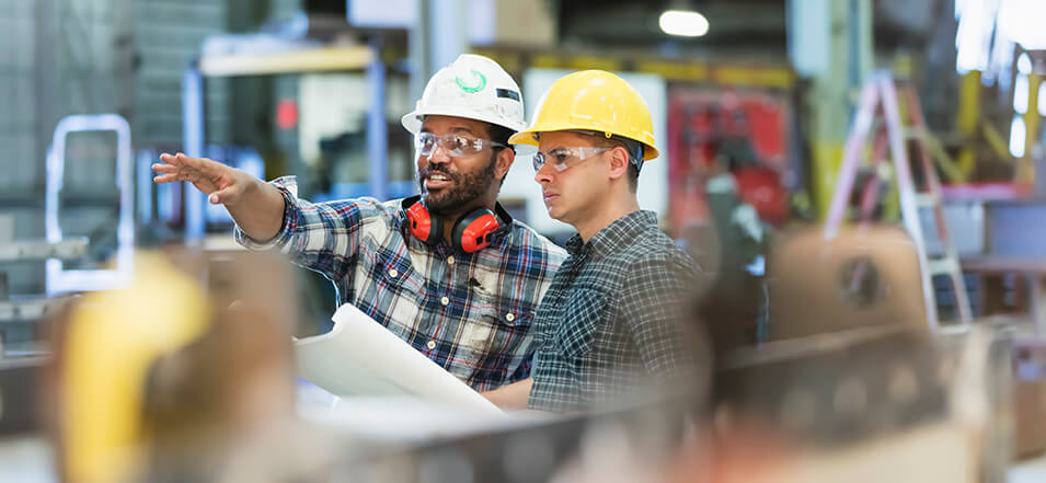 construction workers planning a small business build